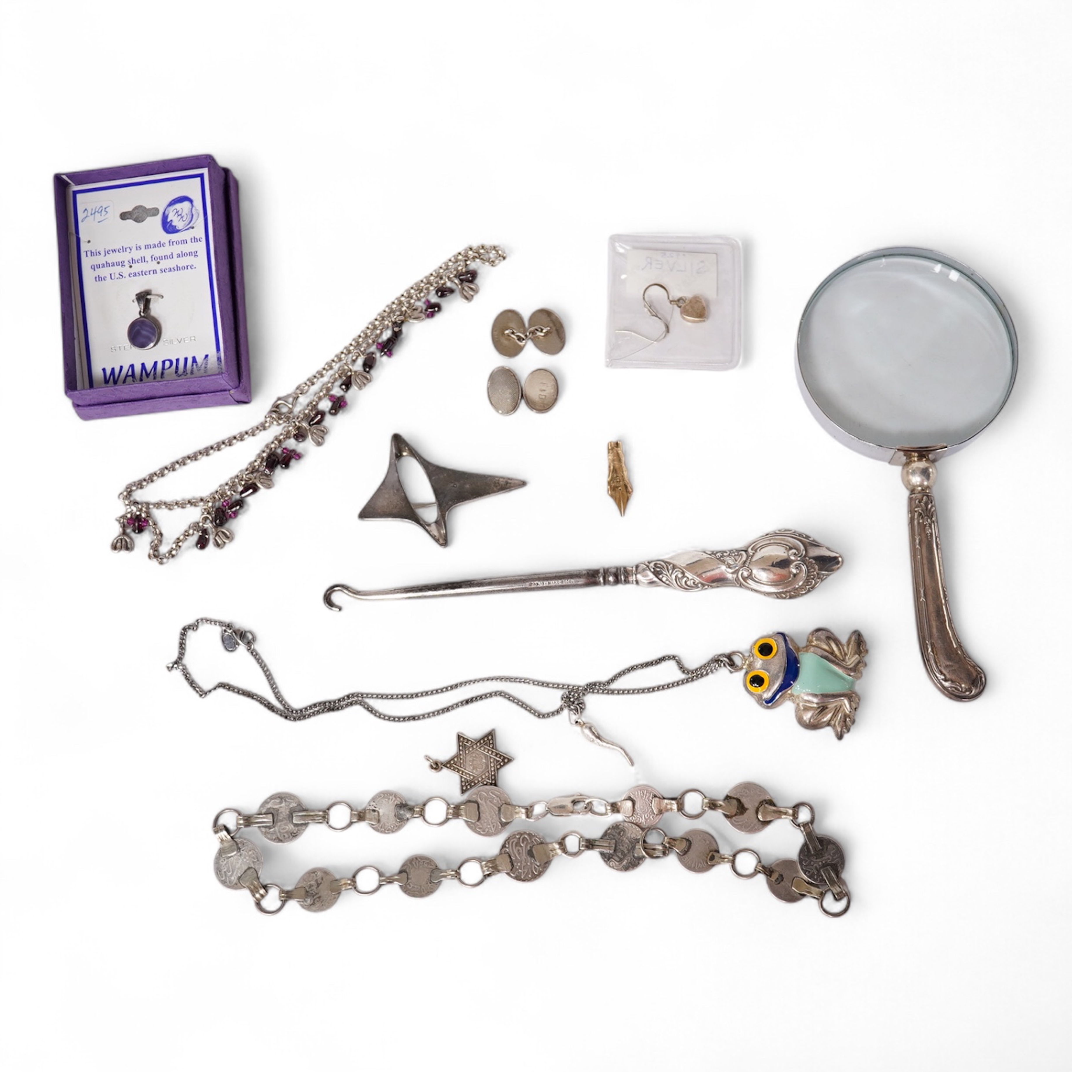 An early 1960's Georg Jensen sterling brooch, no. 339 (designed by Henning Koppel, 58mm, together with a small group of jewellery and other items including a pair of silver oval cufflinks, a Persian coin necklace, a 14ct